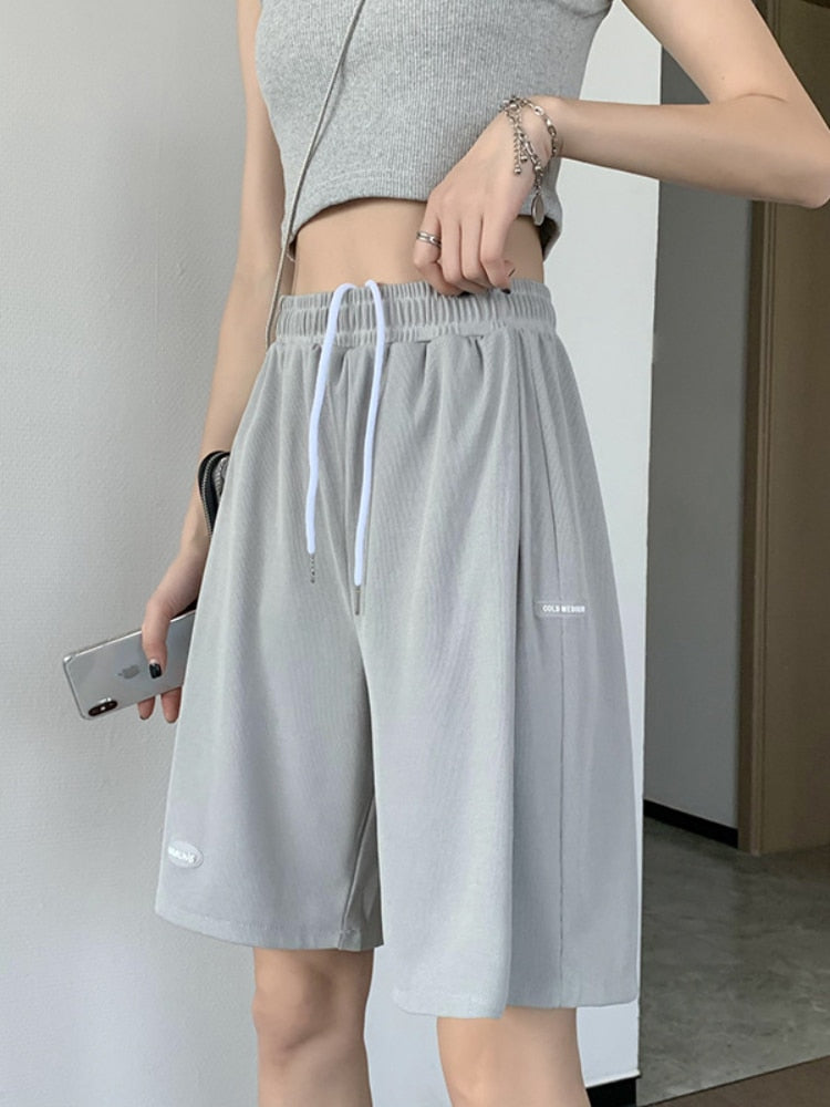 Pantalon large en soie glacée pour femme