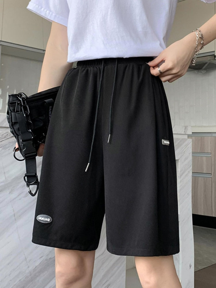 Pantalon large en soie glacée pour femme