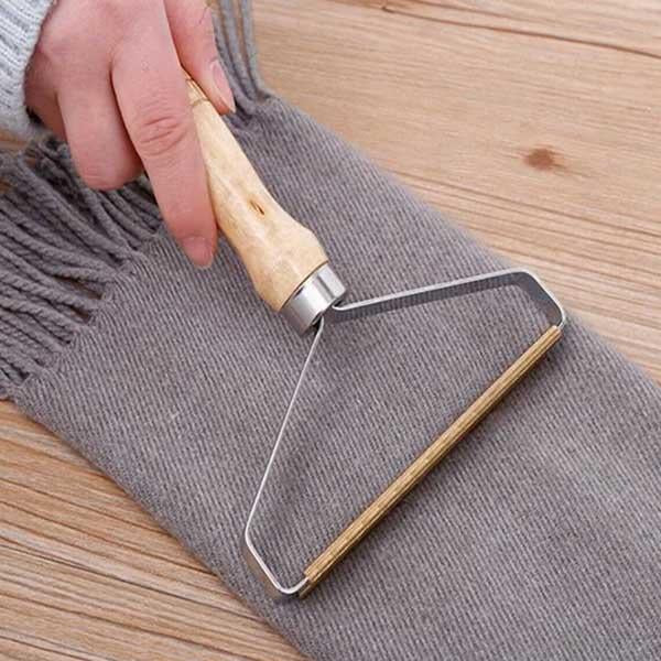 Brosse anti-poils et anti-peluches